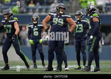 GREEN BAY, WI - NOVEMBER 14: Seattle Seahawks defensive tackle Al Woods (99)  mimics the call of