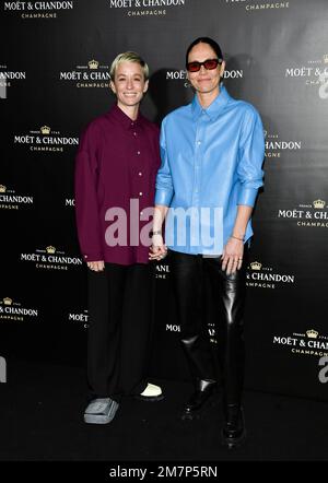 Megan Rapinoe, left, and Sue Bird attend the Moet & Chandon holiday