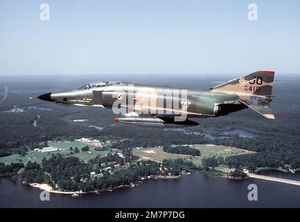 AN air-to-air left side view of an RF-4C Phantom II aircraft from the 62nd Tactical Reconnaissance Squadron. Base: Nellis Air Force Base State: Nevada (NV) Country: United States Of America (USA) Stock Photo