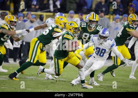 Green Bay Packers' Keisean Nixon trto get past Chicago Bears' Josh Blackwell  during the first half of an NFL football game Sunday, Dec. 4, 2022, in  Chicago. (AP Photo/Charles Rex Arbogast Stock