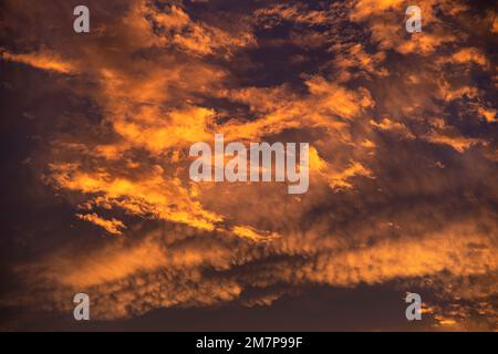 Texture of sunset with clouds on a red sky Stock Photo