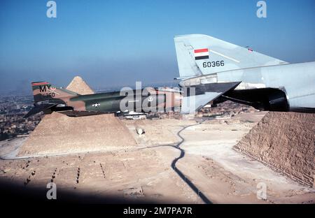 An F-4E Phantom II aircraft, foreground, and other Phantom aircraft of ...