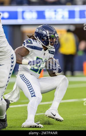 Seattle Seahawks running back Tony Jones Jr. (32) runs with the ball before  an NFL football game against the Los Angeles Chargers, Sunday, Oct. 23,  2022, in Inglewood, Calif. (AP Photo/Kyusung Gong