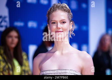 Rosy McEwen poses for photographers upon arrival for 'The British