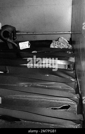 An interior view of damage caused to the aircraft carrier USS MIDWAY (CV41) when it collided with the Panamanian freighter CACTUS. Base: Naval Station, Subic Bay State: Luzon Country: Philippines (PHL) Stock Photo