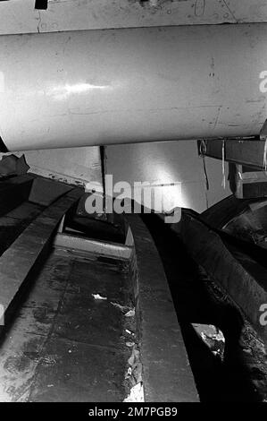 An interior view of the damage caused to the aircraft carrier USS MIDWAY(CV 41) when it collided with the Panamanian freighter CACTUS. Base: Naval Station, Subic Bay State: Luzon Country: Philippines (PHL) Stock Photo