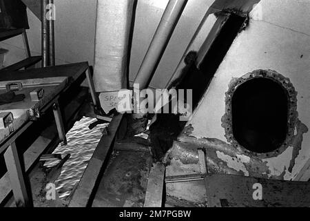 An interior view of damage caused to the aircraft carrier USS MIDWAY (CV41) in a collision with the Panamanian freighter CACTUS. Base: Naval Station, Subic Bay State: Luzon Country: Philippines (PHL) Stock Photo