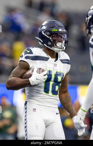 Seattle Seahawks wide receiver Laquon Treadwell (18) catches a pass and  runs against the Los Angeles Rams in an NFL football game, Sunday, Dec. 4,  2022, in Inglewood, Calif. Seahawks won 27-23. (