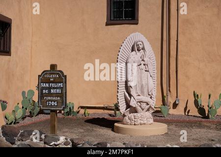 Albuquerque, New Mexico - Sept. 25, 2021: Statue of Our Lady of Guadalupe in front of San Felipe De Neri church, the oldest church in Albuquerque Stock Photo