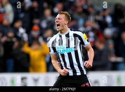 Newcastle United's Dan Burn celebrates scoring their side's first goal of the game during the Carabao Cup Quarter-Final match at St. James' Park, Newcastle. Picture date: Tuesday January 10, 2023. Stock Photo