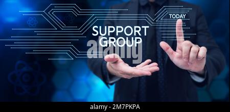 Sign displaying Support Group. Business concept number of people involved in service commitment Stock Photo