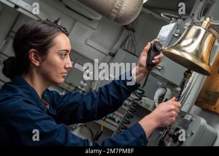 220511-N-UP745-1060 IONIAN SEA (May 11, 2022) Ensign Emily Gothard, from Houston, rings the fire alarm during an in-port emergency team drill, aboard Arleigh-Burke class guided-missile destroyer USS Jason Dunham (DDG 109), in the Ionian Sea, May 11, 2022. Jason Dunham is a part of the Harry S. Truman Carrier Strike Group on a scheduled deployment in the U.S. 6th Fleet area of operations in support of U.S., allied and partner interest in Europe and Africa. CSG8,Ionian Seas,Ops,USN,USS Jason Dunham, Stock Photo