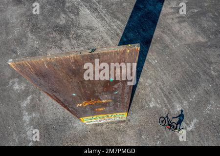 Sculpture Bramme for the Ruhr Area by Richard Serra, on the Brammentrail, mountain bike trail on the Schurenbach slagheap, in Essen NRW, Germany, Stock Photo