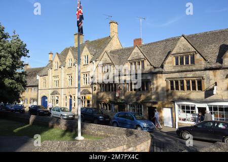 Buildings in High Street Chipping Campden England UK, Cotswold town English historical architecture period properties Badgers Hall and Co op store Stock Photo