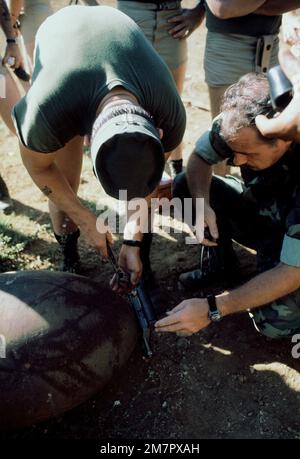 United States Air Force explosive ordnance disposal technicians are ...