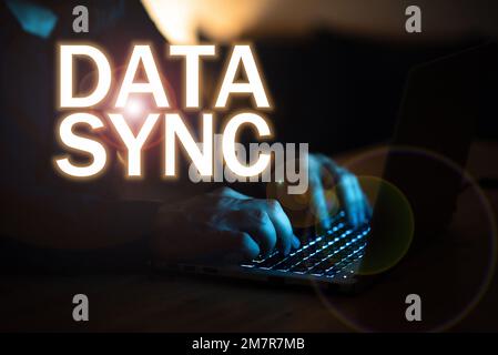 Hand writing sign Data Sync, Business overview data that is continuously generated by different sources Stock Photo