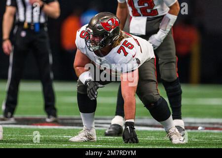 Tampa Bay Buccaneers guard John Molchon (75) walks to the locker