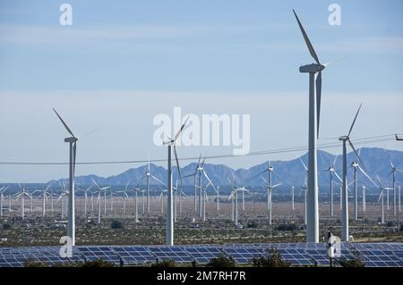 renewable green power windmills and solar panels in the California desert Stock Photo