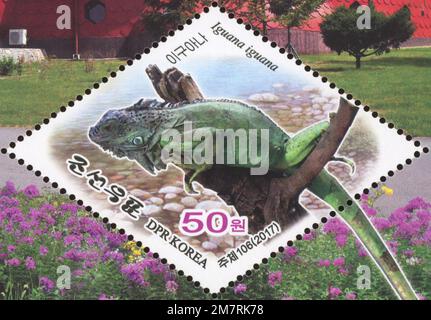 2017 North Korea stam set. Pyongyang Central ZOO. Reptile house, Green iguana, Iguana iguana Stock Photo