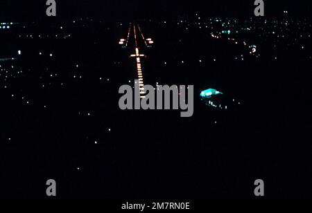 A nighttime aerial view of the runway approach. Base: Yokota Air Base Country: Japan (JPN) Stock Photo