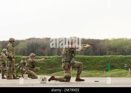 Sgt. Josiah Bell of Rochester, Minnesota, an Infantryman with the Wisconsin National Guard’s B Company, 1st Battalion, 128th Infantry Regiment, fires an M9 pistol. He is one of twelve National Guard Soldiers are competing in the Region IV Best Warrior Competition May 11-15, 2022, at Camp Ripley, Minnesota. The annual competition tests the military skills, physical strength and endurance of the top Soldiers and noncommissioned officers from the Minnesota, Wisconsin, Iowa, Illinois, Michigan, Indiana, and Ohio National Guards. The winners will move on to compete in the National Guard’s competiti Stock Photo