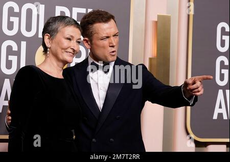 Christine Egerton, Left, And Taron Egerton Arrive At The 80th Annual ...