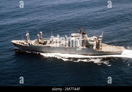 A port beam view of the ammunition ship USS BUTTE (AE-27) underway ...