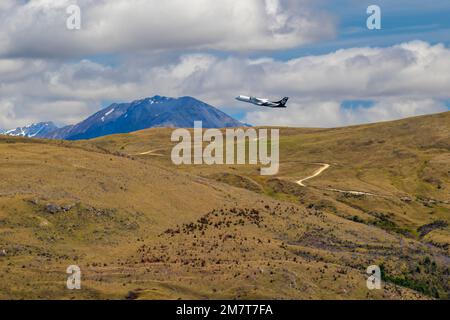 Air NZ aeroplane taking off from Queenstown Airport, New Zealand ...