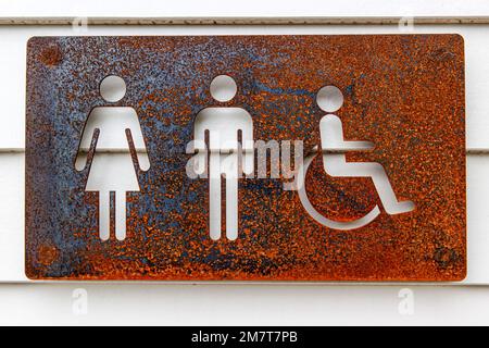 Rustic iron public toilet sign, Arrowtown, New Zealand, Tuesday, December 27, 2022. Stock Photo