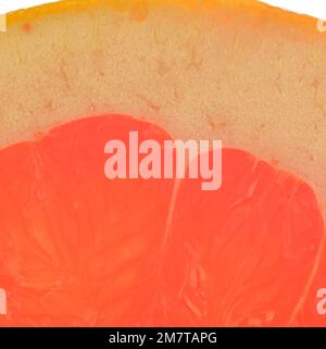 Fresh organic grapefruit slice on white background. Grapefruit close-up. Slice of blood red ripe grapefruit. Texture of red juicy grapefruit. Macro im Stock Photo