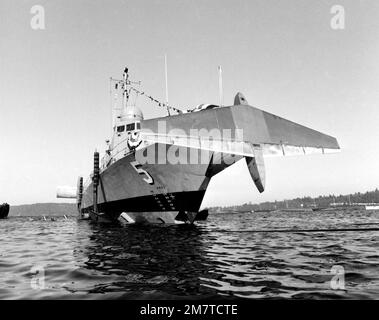 A starboard bow view of the guided missile patrol combatant (hydrofoil) ARIES (PHM-5) sliding down the ways during launching. The vessel was built by Boeing Marine Systems. Base: Renton State: Washington (WA) Country: United States Of America (USA) Stock Photo