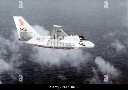 An air-to-air right side view of an S-3A Viking anti-submarine aircraft of Air Anti-submarine Squadron 38 (V-38). The aircraft is flying from the aircraft carrier USS CONSTELLATION (CV-64). Country: Unknown Stock Photo