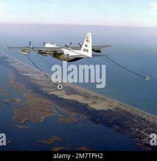 A left rear view of a KC-130F Hercules aircraft from Marine Refueler-Transport Squadron 252 (VMGR-252) in flight. Base: Cape Hatteras State: North Carolina (NC) Country: United States Of America (USA) Stock Photo