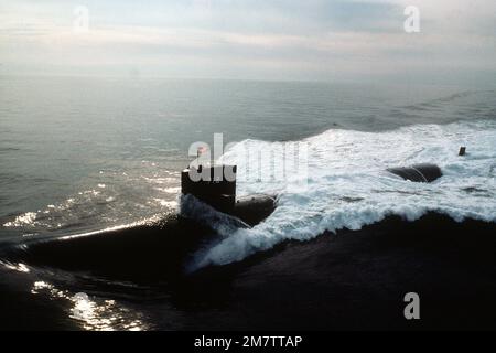 An aerial port bow view of the nuclear-powered attack submarine USS ATLANTA (SSN-712) during sea trials. Country: Atlantic Ocean (AOC) Stock Photo
