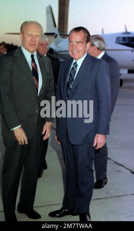 Former Presidents Gerald Ford (left) and Richard Nixon chat for a moment as they prepare to depart for Egypt. They will attend the funeral for slain Egyptian President Anwar Sadat. Base: Andrews Air Force Base State: Maryland (MD) Country: United States Of America (USA) Stock Photo