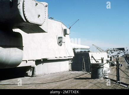 A view from the starboard deck looking forward past a 16-inch/50-caliber gun turret on the IOWA (BB-61). The ship is in mothball storage at the Philadelphia Navy Yard. Base: Philadelphia State: Pennsylvania (PA) Country: United States Of America (USA) Stock Photo