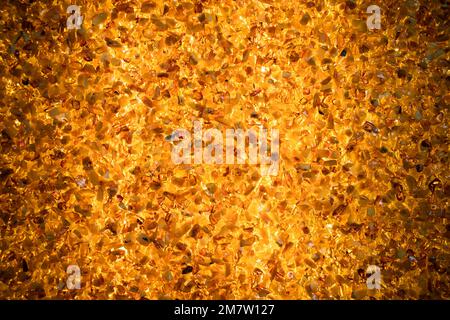 Natural amber mosaic, close-up background photo Stock Photo