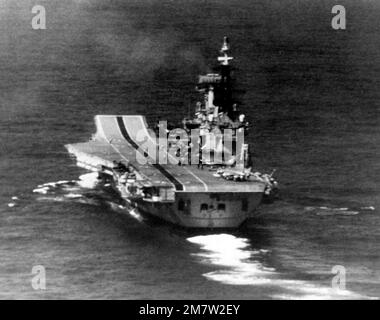 Aerial stern view of the British aircraft carrier HMS HERMES (R-12) underway. Country: Unknown Stock Photo