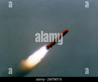 A view of a BGM-109 Tomahawk missile in flight during a land attack conventional missile operation test near the Pacific Missile Test Center, Point Mugu, California. Country: Pacific Ocean (POC) Stock Photo