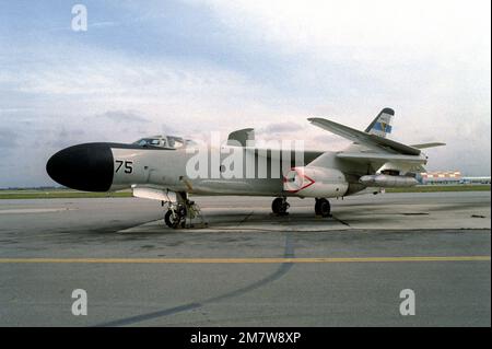 A left front view of an NRA-3B Skywarrior aircraft equipped with electronic warfare (jammer) pods, with its wing folded up at the Pacific Missile Test Center. Base: Naval Air Station, Point Mugu State: California (CA) Country: United States Of America (USA) Stock Photo