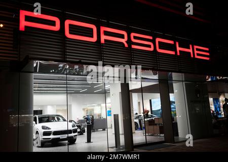 Yokohama, Kanagawa, Japan. 5th Nov, 2022. A Porsche luxury car dealership in Yokohama.Porsche AG is a German luxury automotive manufacturer founded in 1931 and headquartered in Stuttgart, Germany. Known for its high-performance sports cars and SUVs, Porsche is a subsidiary of Volkswagen AG. The current CEO is Oliver Blume and Porsche Automobil Holding SE is the majority stakeholder of Porsche AG. The Porsche and PiÃ«ch families together own a majority of the voting shares in Porsche Automobil Holding SE.Minato Mirai 21 (ã¿ãªã¨ã¿ã‚‰ã„21) is a large urban development located in Yokoh Stock Photo