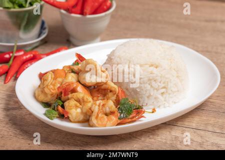 Shrimp basil with steamed rice.Thai spicy food.Street food Stock Photo