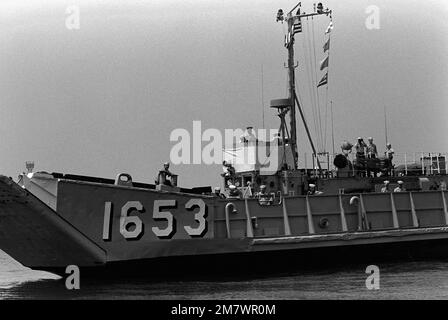 A port bow view of the utility landing craft (LCU-1653). The LCU is being used to assist on the transfer of approximately 600 Americans and third nation personnel, to the amphibious ships USS NASHVILLE (LPD-13) and USS HERMITAGE (LSD-34), during the evacuation from Beirut. Base: Juniyah Country: Lebanon (LBN) Stock Photo