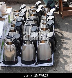 Kiev, Ukraine March 11, 2021: People, rows of goods and aisles at the antique market on Petrovka in the city of Kiev Stock Photo