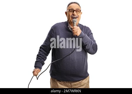 Happy mature man singing with a microphone isolated on white background Stock Photo