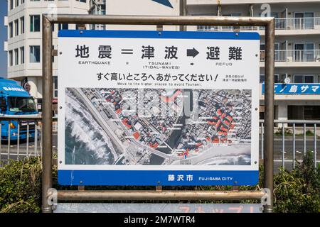 Japan, Kamakura: sign showing the tsunami / tidal wave evacuation routes and safe zones, Honshu Island Stock Photo