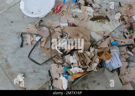 trash near the house and started to decompose Stock Photo