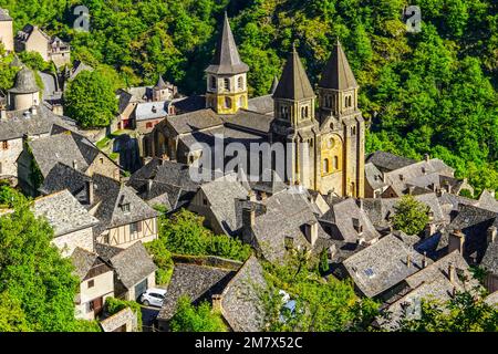 Elevated view of Conques village and abbey-church of Sainte-Foy the jewel of Romanesque architecture, Occitanie, France. Stock Photo