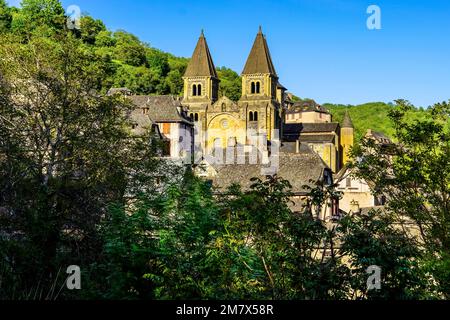 Beautiful hillside view of medieval hillside village of Conques; France. Stock Photo
