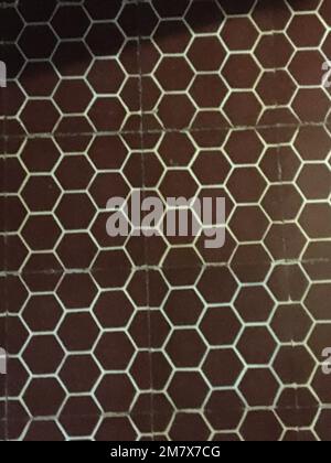 Tiled floor of an old bathroom Stock Photo